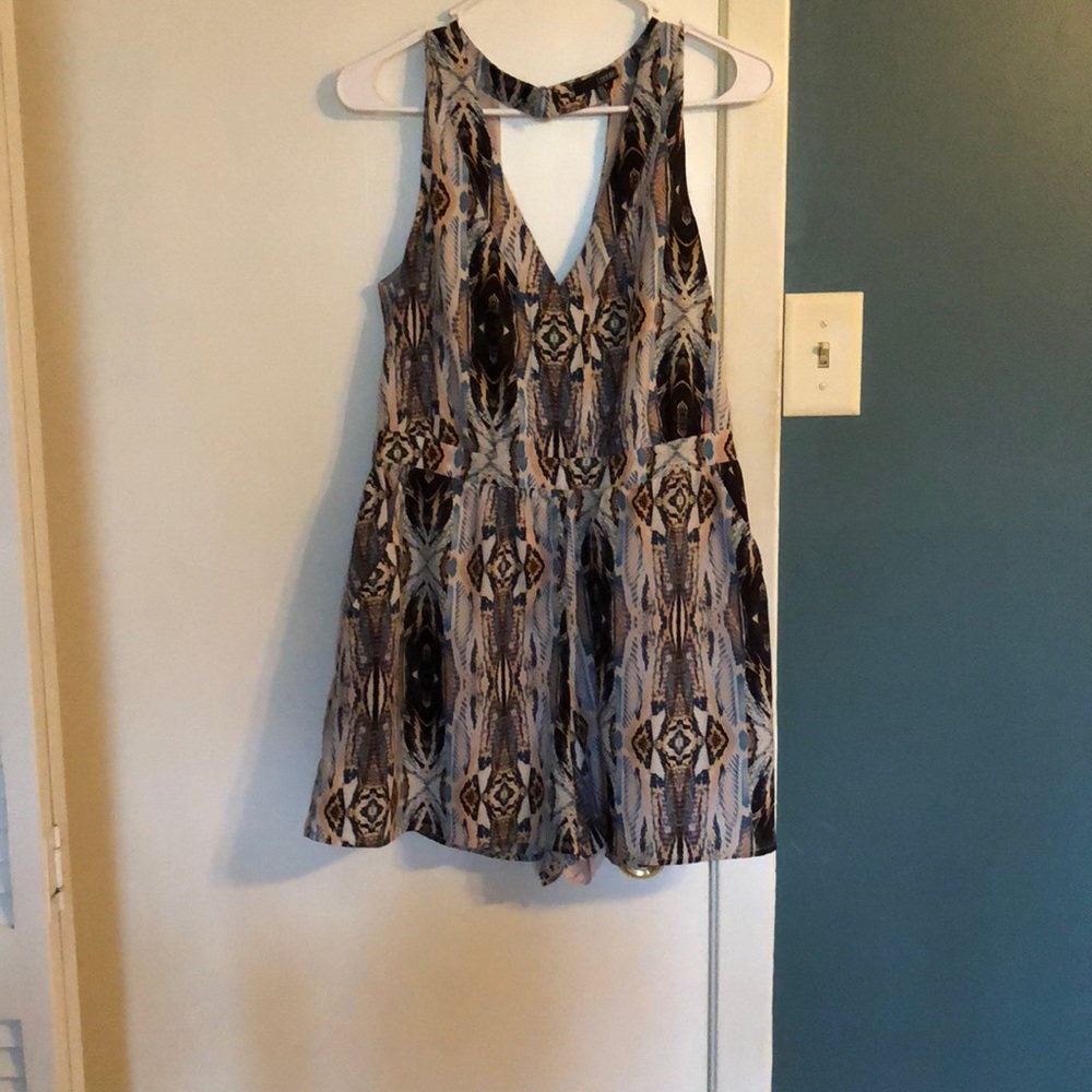 Snakeskin print romper.